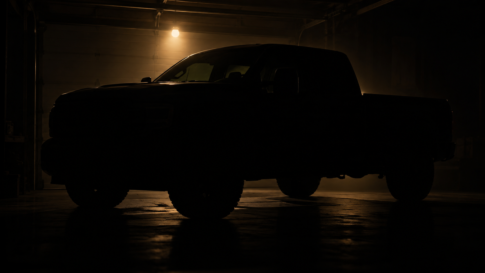 dark silhouette of a pickup truck